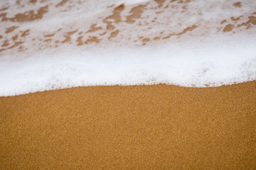 Wave on the sand beach