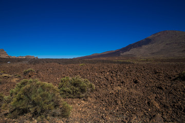 Teide volcanic rocks. desert in the mountains and blue sky