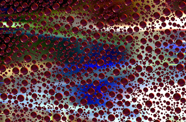 Red small spheres, bubbles on colorful abstract background
