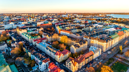 Aerial sunset view of beautiful city Helsinki . Colorful sky and colorful buildings. Helsinki, Finland.