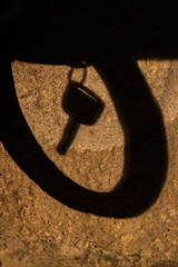 Car Key Shadow Hanging in a Circle