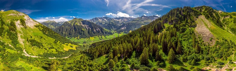 Aerial view of Elm village and Swiss mountains - Piz Segnas, Piz Sardona, Laaxer Stockli from Ampachli, Glarus, Switzerland, Europe - obrazy, fototapety, plakaty