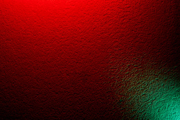 Red background with green spot in the corner