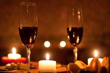 Red wine and candles - romantic evening.