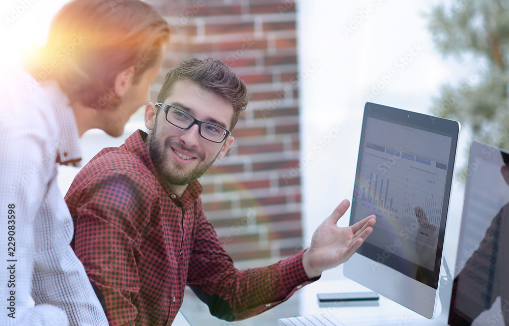 Poster employees of the company, discussing the statistics