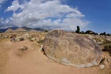 Ancient petroglyph depicting mountain goats located in Cholpon Ata, Issyk-Kul lake  shore, Kyrgyzstan,Central Asia