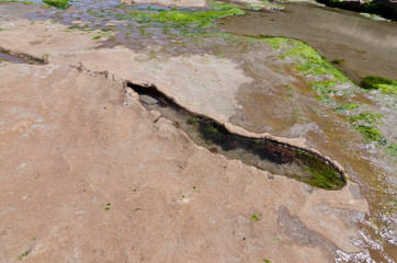 crack with water on the cliff