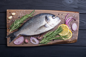 Raw dorado fish and ingridient for cooking
