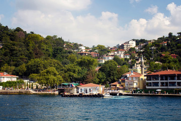 Fototapeta na wymiar View of historical, old ferry pier and neighborhood by Bosphorus on Asian side of Istanbul.