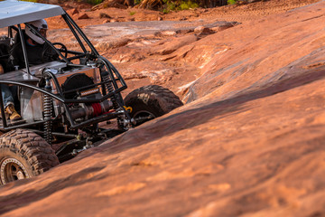 A Custom 4x4 Rock Crawler Off-Roading In The Sandstone Red Rock Terrain Outside Of Moab Utah In The American Southwest © SIX60SIX