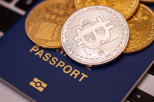 foreign passports and bitcoin coin ukraine and cryptocurrency concept