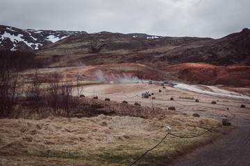 mountain landscape with blue sky and clouds. Geisyr valley
