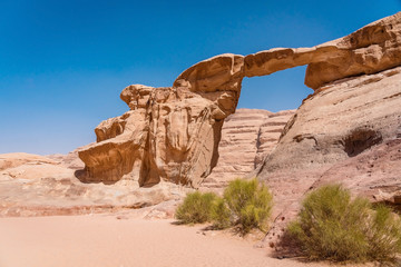 Scenic view of Um Fruth rock arch in Wadi Rum desert, Jordan.