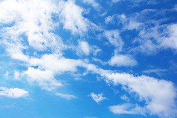 Fototapeta premium Abstract fluffy clouds pattern on blue sky at daylight on summer season background 