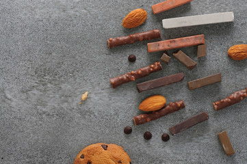 chocolates and pastel crayons on a table