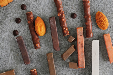 chocolates and pastel crayons on a table