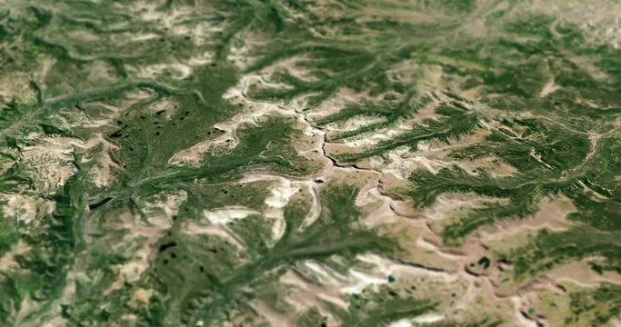 Very high-altitude circular tracking shot of Uinta mountains, Utah with tilt-shift effect. Reversible. Elements of this image furnished by NASA. 