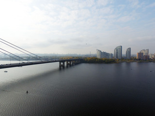 Cityscape on the Dnieper river, Kiev city, Moscow bridge,Drone aerial image.