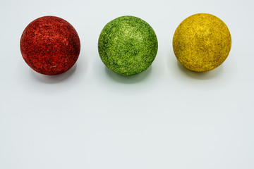 Red, green and golden christmas ball.
