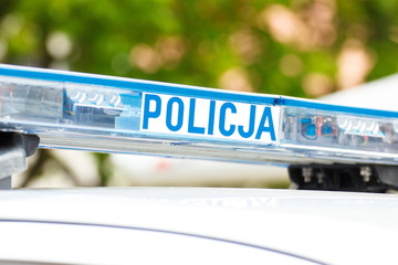 Obraz premium Sign polish police on car