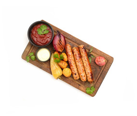 grilled sausages on a cutting board