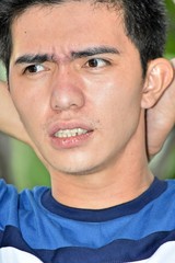 Obraz premium Stressed Filipino Male