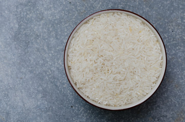 Uncooked Rice In Ceramic Bowl.