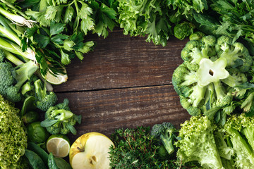 Healthy food ingredients background vegetables fruit herbs top view