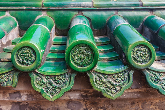 Old roof of Chinese temple with beautiful green glazed tile pattern at the Temple of Heaven in Beijing, China
