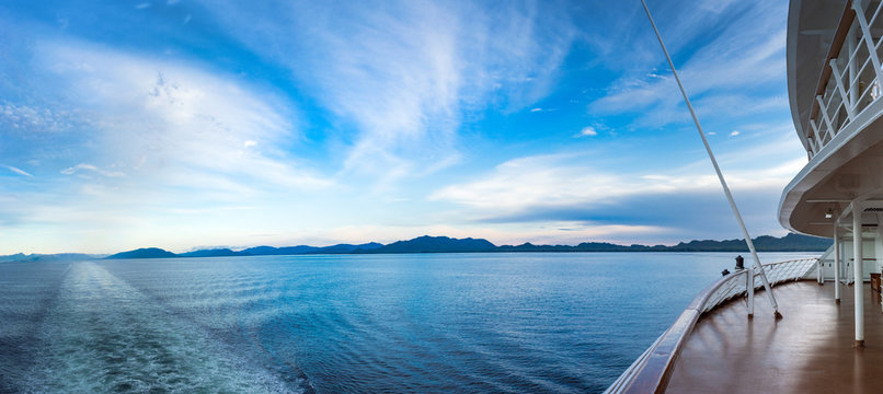 Early evening panoramic view of Dixon Entrance, BC from stern of cruise ship.