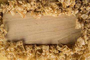 Oak board covered in wood shavings