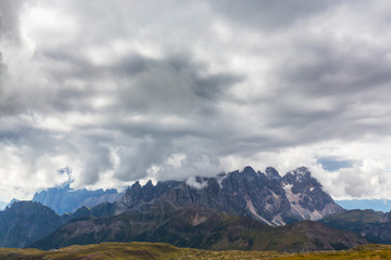 Fototapeta na wymiar Beautiful cloudscape and rain clouds in the Dolomite Alps in summer