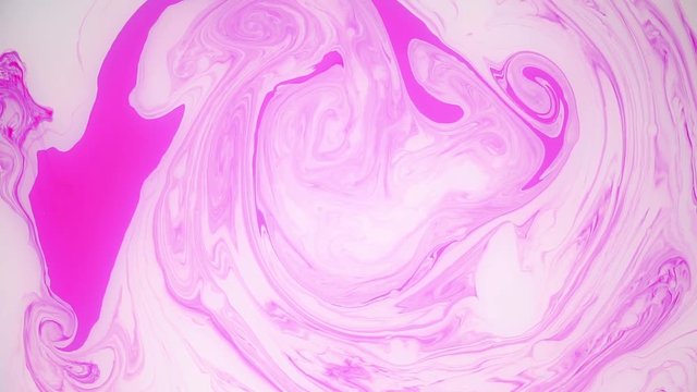 Abstract paint ink in motion. Psychedelic background footage. Colorful spots.