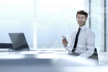 businessman sitting in a spacious office