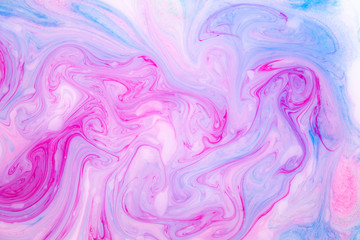 Abstract paint ink, psychedelic background. Colorful spots on water surface.