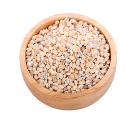 barley in wooden cup isolated on white
