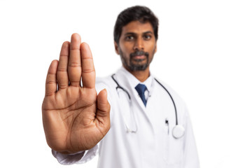 Stop gesture made with palm by doctor.