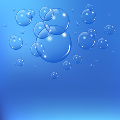 Realistic soap bubbles set isolated on the blue background. vector Illustration