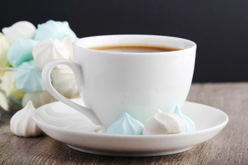 A cup of coffee and meringues for breakfast