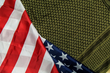 Fototapeta premium The united states of America flag and Shemagh abstract background.