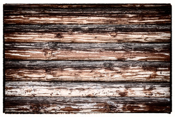 The wall of an old log house as a background.