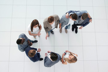 top view.a group of employees standing in the lobby of the office