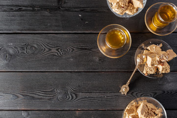 Tasty halva with tea on the table