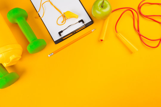 Mockup Clipboard With Gym Equipment Dumbbell On Yellow Background