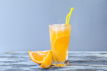Fresh summer cocktail in glass on wooden table