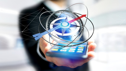 Business man using a navigation compass on a smartphone - 3d rendered