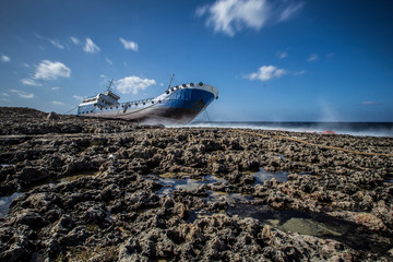 Abandoned shipwreck which ran aground at the coast of Malta.