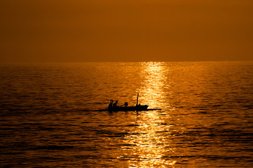 fisher boat during sunset in Lombok Indonesia