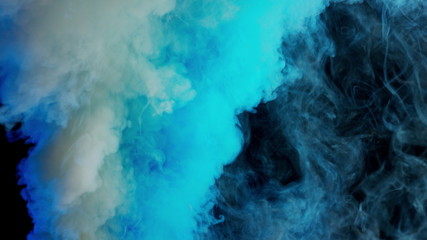 Fototapeta na wymiar white and blue bomb smoke on black background