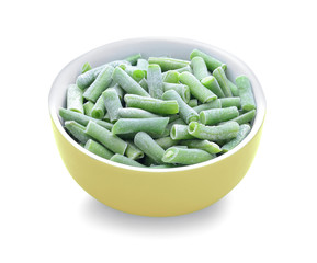 Bowl with frozen green beans on white background